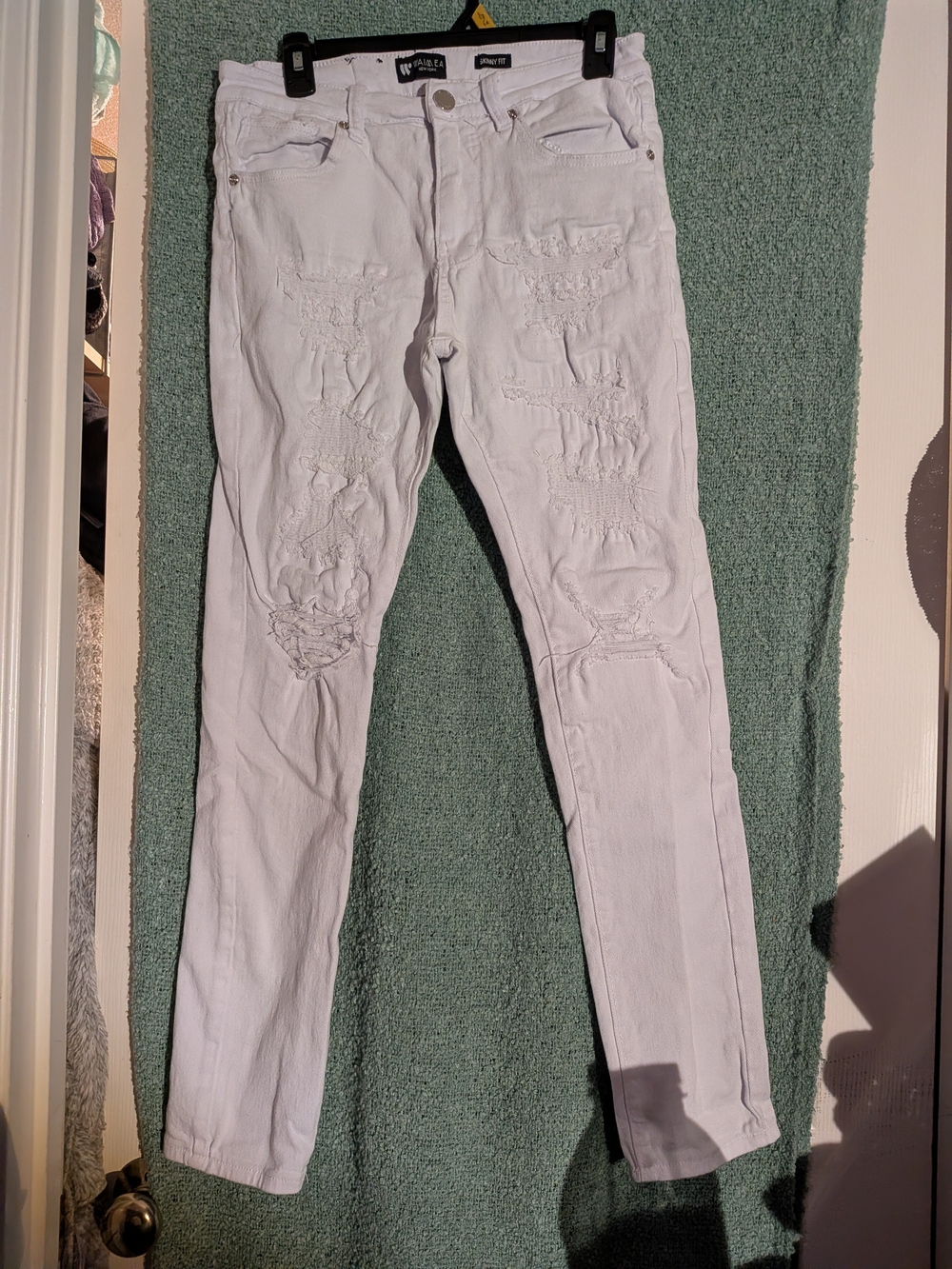Distressed White Skinny Jeans - Women